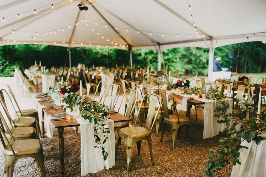Reception Farmhouse Seating in Courtyard under Tent w Gold Industrial Chairs.jpg